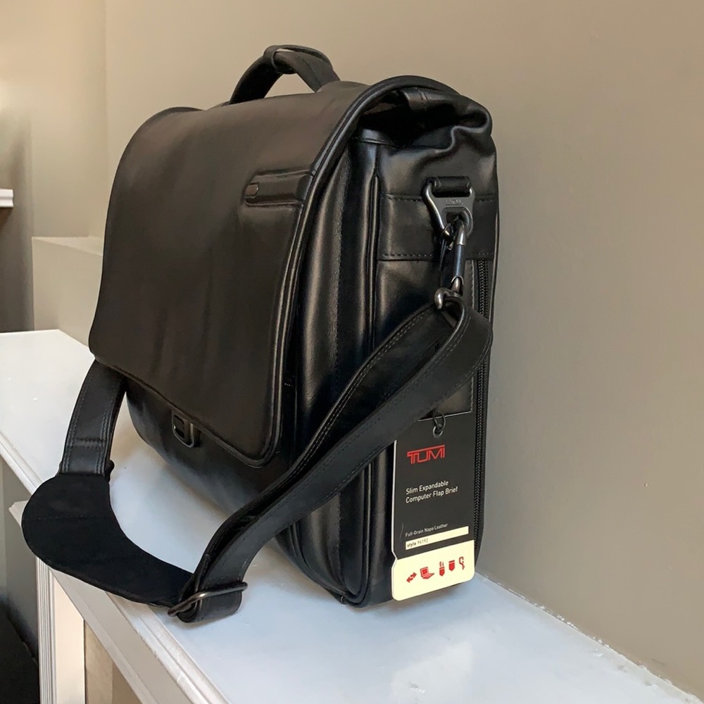 NWT Tumi expandable computer bag.